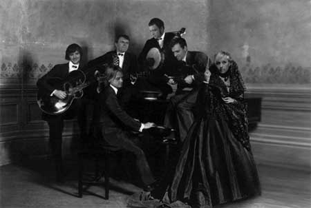 [ Band photo is derativated art based on Gerhard Sisters photography "Musicians" and J. Laurent photography"Madrid. Dame avec mantille" ]